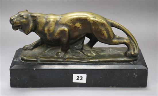 A bronze tiger on a marble base